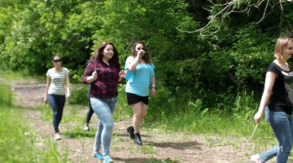 Girls rest on nature, breathe fresh air and play with their dog. Shit-dog did not expect that some girls cooked for him very large pieces of shit, which he must swallow.